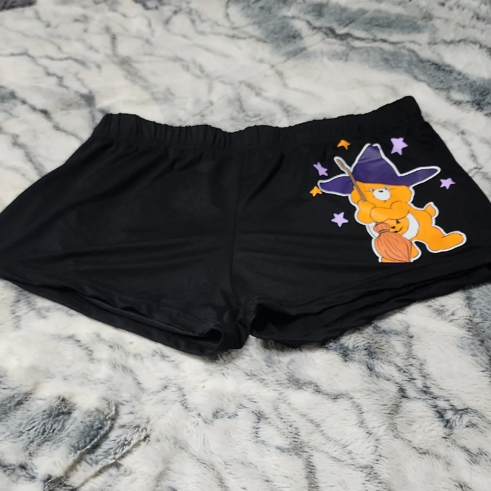 Care Bears Black Shorts with Orange and Purple Print